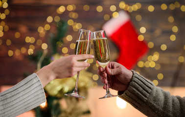 Cheers concept. New year tradition. Glass filled sparkling wine or champagne. Having nice time. Toast. Glass of champagne. Champagne couple glasses. Merry christmas. Almost midnight. Alcohol drink