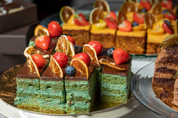 Slicing tasty green lime cake close up