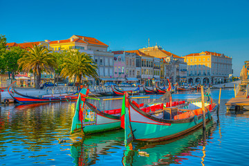 Moliceiro boats mooring alongside the central channel at Aveiro, Portugal