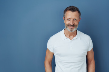 Attractive casual bearded man in a white t-shirt