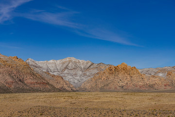 Naklejka na ściany i meble Winter snowy landscape of the famous Red Rock Canyon