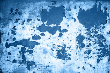 Background from blue color metal door with paint peeling off from old age many year. Textured classic method 