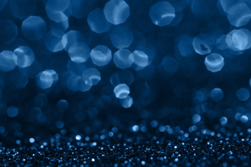 color of year, shinig blue bokeh on black background, 2020, overlay layer.