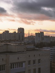 Evening winter red sky, pink sunset, panorama of the residential quarter in St. Petersburg