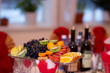 Various fruits close-up. Fruit on the table in the dining room.