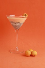 glass with chia and medlars pudding