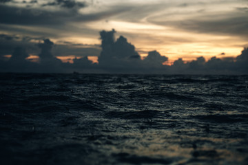 raindrops in sea in sunset