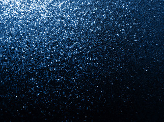 Blurred sizzling shimmering festive background