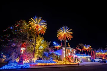 Fotobehang Christmas lights, decoration of a house © Kit Leong