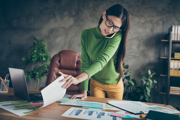 Photo of pretty business lady speak telephone partners important company startup investment look...