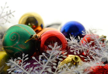 Christmas colorful shiny Cristmas balls with shimmering garland and fluffy decor