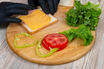Process of cooking sandwich. variety of fillings and ingredients.Homemade Fast Food concept
