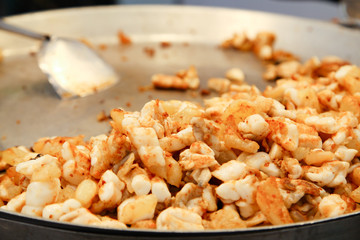 Stir fried squid eggs on flat pan