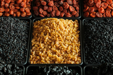 super food. counter with dried fruits on the market. Vegan Food.