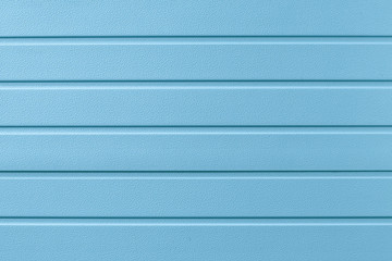 Fototapeta premium Metal wall siding, cladding. Blue abstract background with lines. Metallic striped surface.