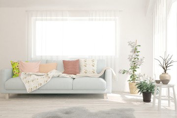 Realistic room in white color with sofa. Scandinavian interior design. 3D illustration