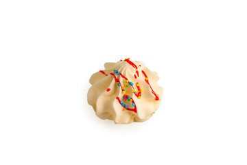 This is a meringue cookie in the shape of a Christmas tree with sprinkles on a white background, object.