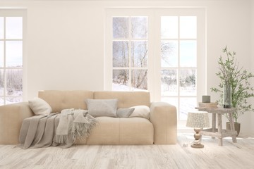 Stylish room in white color with sofa and winter landscape in window. Scandinavian interior design. 3D illustration