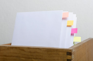 Closeup of blank paper, bookmarks.Concept of organization of documentation