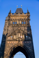 Fototapeta na wymiar Old Town Bridge Tower guarding end of the Charles Bridge and entrance to Old Town of Prague, Czech Republic, sunny summer morning