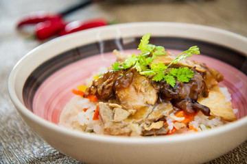 Vietnamese style caramel pork with rice and vegetable