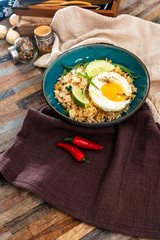 Pad Thai, vegan recipe made with rice noodles, vegetables and peanuts cooked on wok.