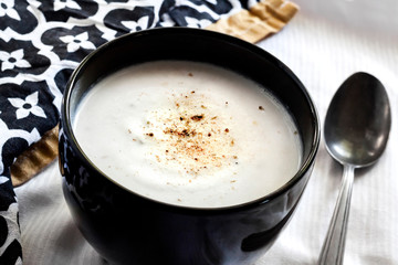 Cauliflower Soup (Creme du Barry) in black bowl