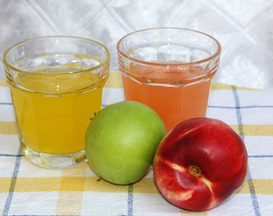 Full glass of fresh soda juice and fruit near it