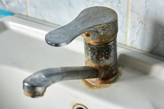 Old, Rusty Faucet In The Kitchen, Limestone, Scum, Need A Replacement.