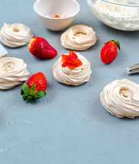small strawberry pavlova meringue cakes pattern with cream top view