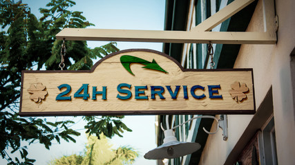 Street Sign to 24h Service