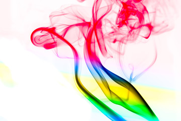 multicolored smoke phot against white background