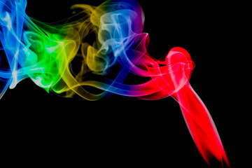 Obraz premium multicolored smoke photo aginst balck background