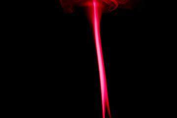single colored smoke aginst black background