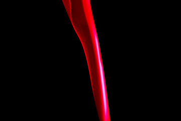 single colored smoke aginst black background