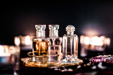 Perfume bottles and vintage fragrance at night, aroma scent, fragrant cosmetics and eau de toilette...