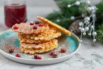 Traditional Belgian waffles with fresh fruits, sprinkled with powdered sugar and cocoa. You can eat...
