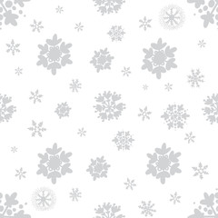 Grey silver or monochrome light seamless snowflakes patterns. Doodle cute design. Great for print, pakage, web pages, clothes. New year and Christmas tender winter style
