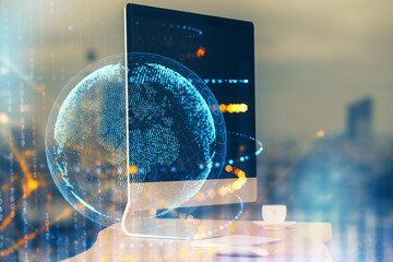 Multi exposure of table with computer and world map hologram. International data network concept.