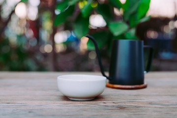 Country hot tea, Teacup placed on a wooden table, Close-up