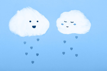 Two clouds made from cotton wool in trendy blue toning. Main color trend for 2020 year.
