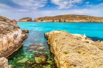 Fototapeta na wymiar The Comino island with turquoise lagoon near the islands Malta and Gozo in the Mediterranean Sea, Europe.