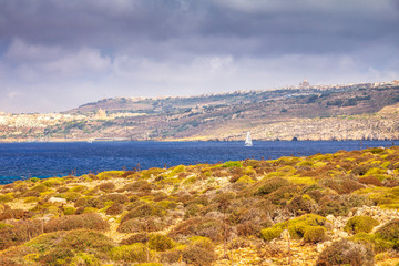 Turquoise lagoon between the islands of Comino and Gozo islands near Malta in the Mediterranean...