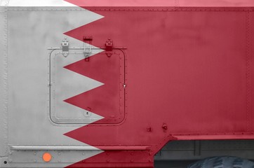 Bahrain flag depicted on side part of military armored truck closeup. Army forces conceptual...