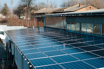Solar Panels on Roof in Residential Estate with Soft focus Background
