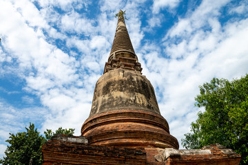 Fototapeta premium Old famous temple Wat Yai Chaimongkol Ayutthaya, Thailand 
