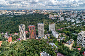 Big city, aerial view. The microdistrict of a big city, residential buildings with many high-rise buildings.