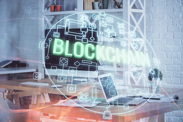 Multi exposure of blockchain theme hologram and table with computer background. Concept of bitcoin...
