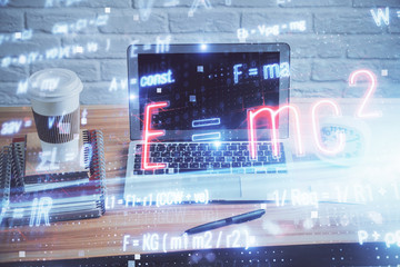 Desktop computer background and formula hologram writing. Double exposure. Education concept.