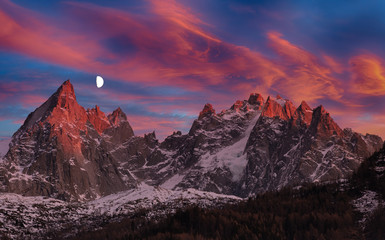 Sunset in French Alps with the moon